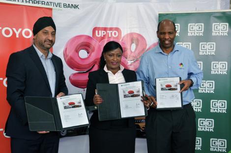 (L-R) Toyota Kenya Managing Director Arvinder S. Reel, Co-op Bank Ag Director Corporate & Institutional Banking Jacqueline Waithaka and Co-op Bank Fleet Africa Leasing Managing Director Robert Mbugua display the deal documents following the sign-off the joint financing deal that will offer up to 95% financing for the purchase of Toyota vehicles.